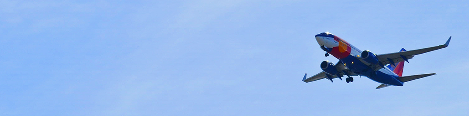 Large aircraft against blue sky