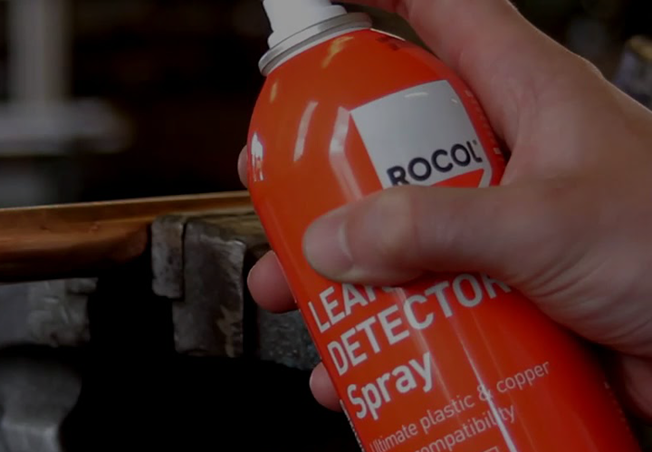 Leak detector spray can being used