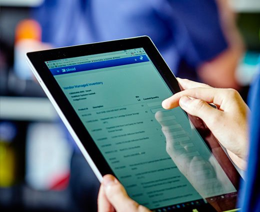 user on tablet device