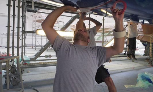 Man working on a plane