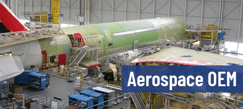 Large aircraft in hangar