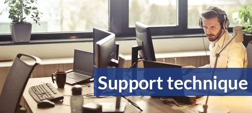 man at computer with headset on