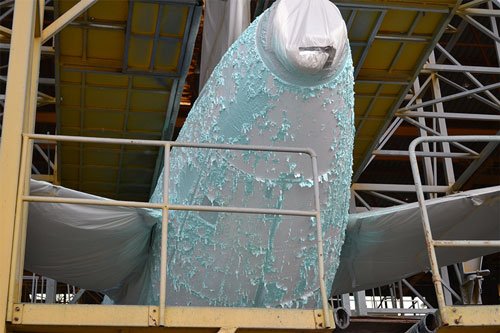 Aircraft undergoing stripping process