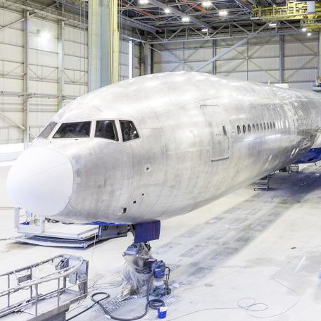 Large aircraft in hangar