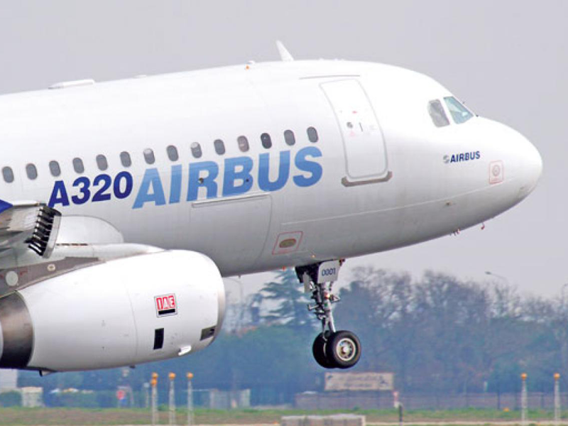 Front end of airbus aircraft taking off with wheel down