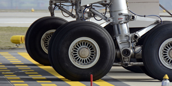 Aircraft wheels on runway