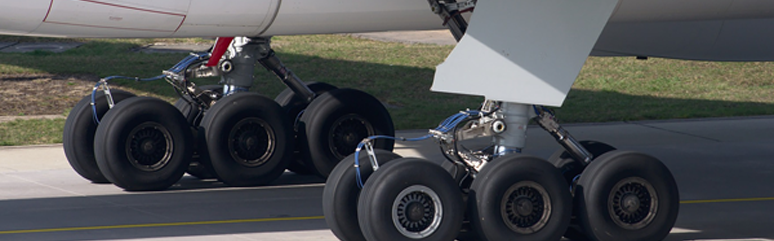 Close up of aircraft tyres on runway