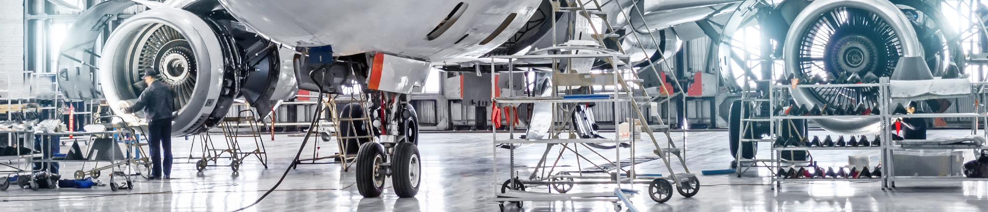 Aircraft in hangar with maintenance being carried out